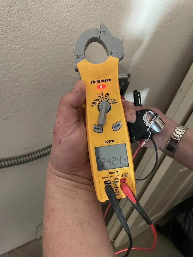 Voltage testing with clamp meter during Generator Installation in Scottsville
